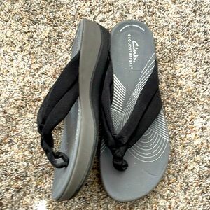 Clark’s wedge flip flops